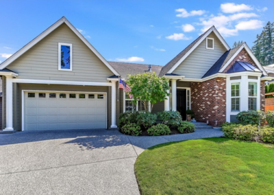 Suburban home with freshly mulched front beds and clean lawn edges